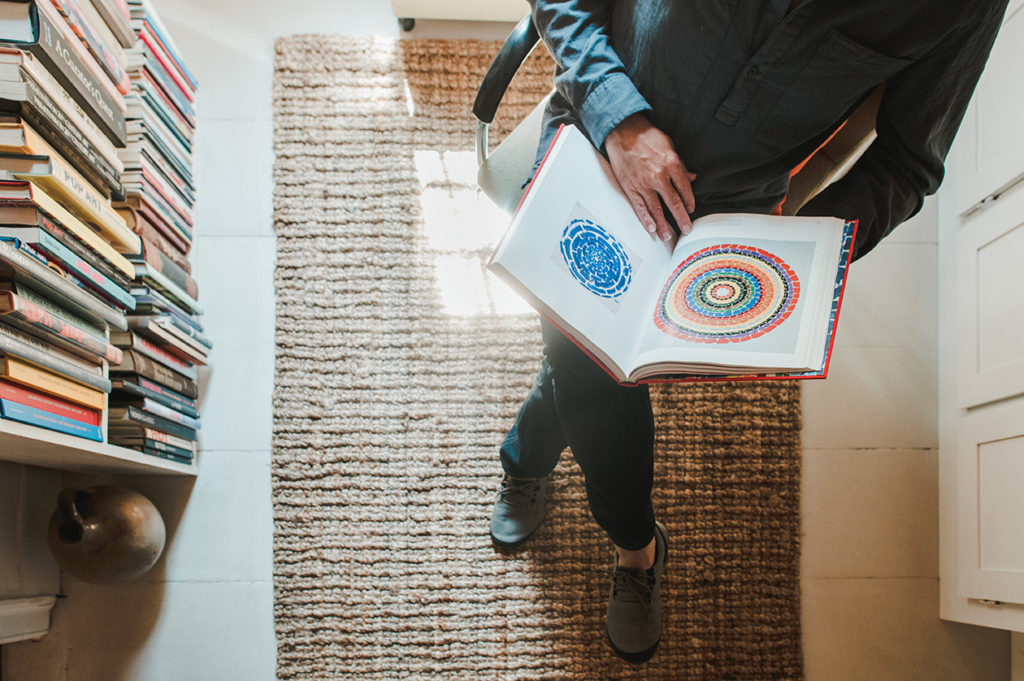 A book of Alma Thomas’ colorful abstract paintings in the library, in their Belfast home.